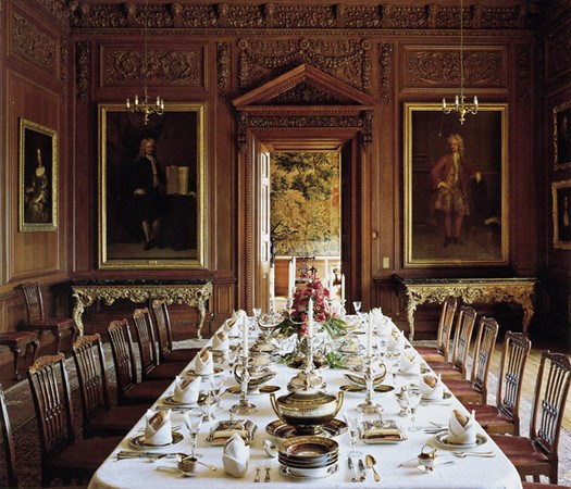 The dining room my favorite room in part because it is so tastefully decorated and not overly ornate The wainscoting on the oak-panelled walls is finely carved